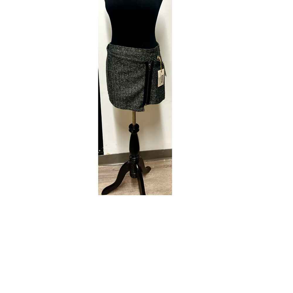 NWT….Guess mini zip up skirt with mesh colors of black,grey, white. SZ: 24